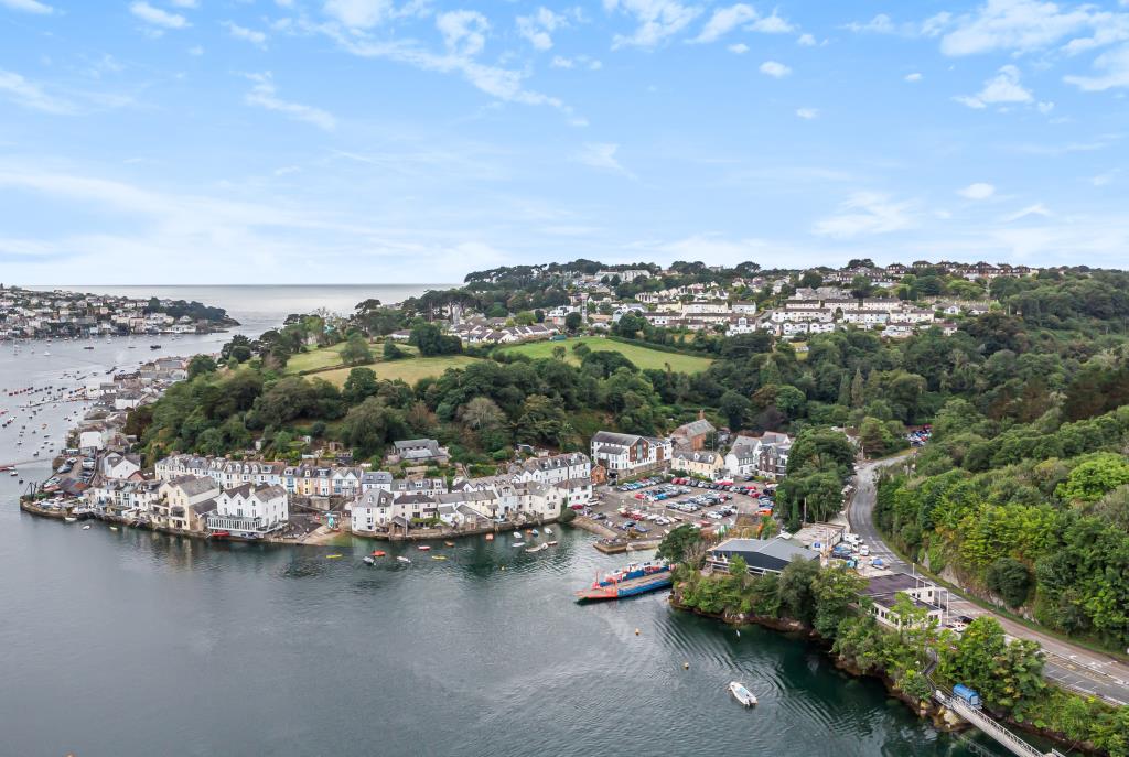 Lot: 160 - SPACIOUS WATER-FRONTING PROPERTY - Ariel view of Fowey showing the property